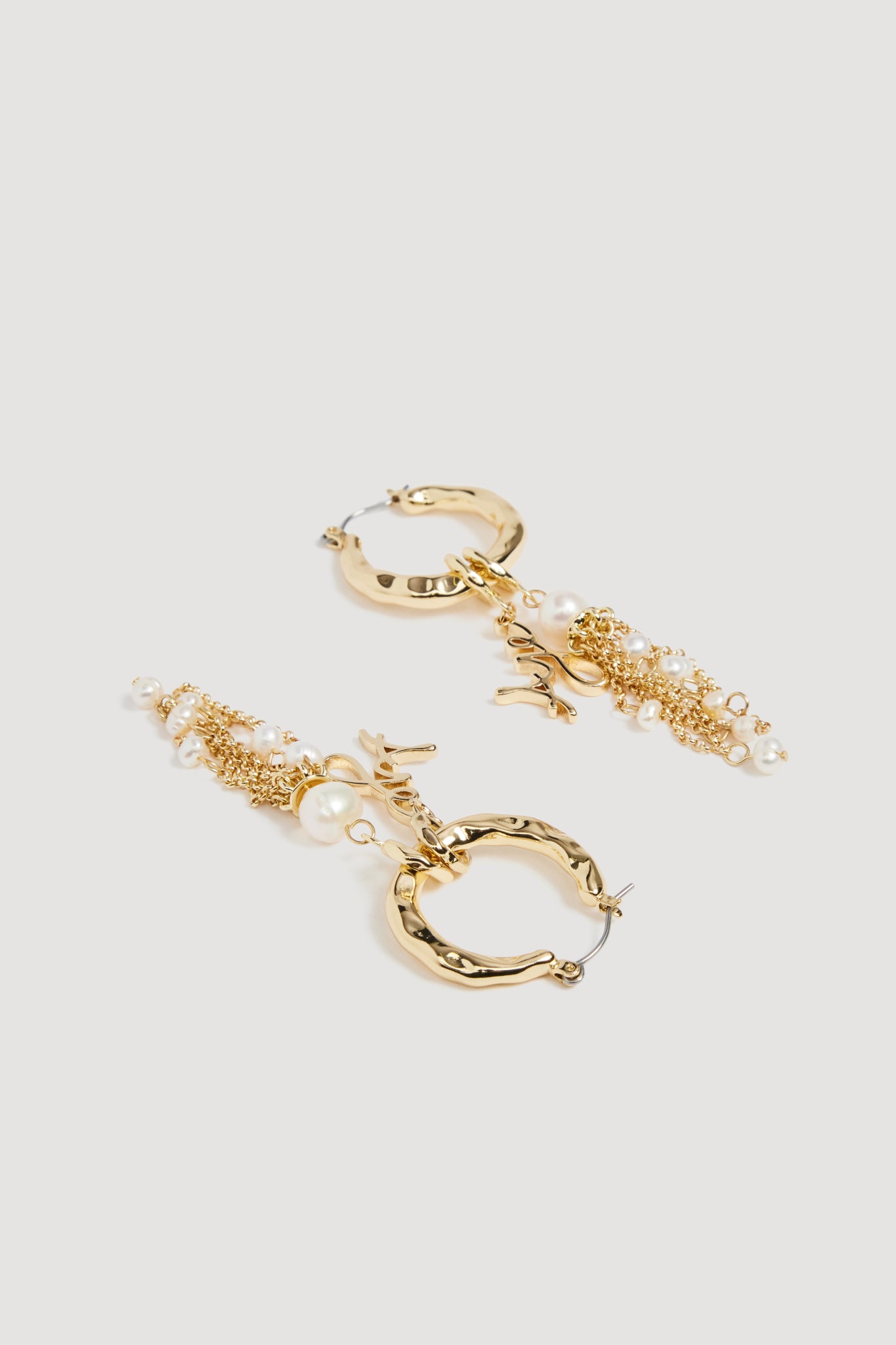 26RE9530_GLD-PRL_3_1758721488