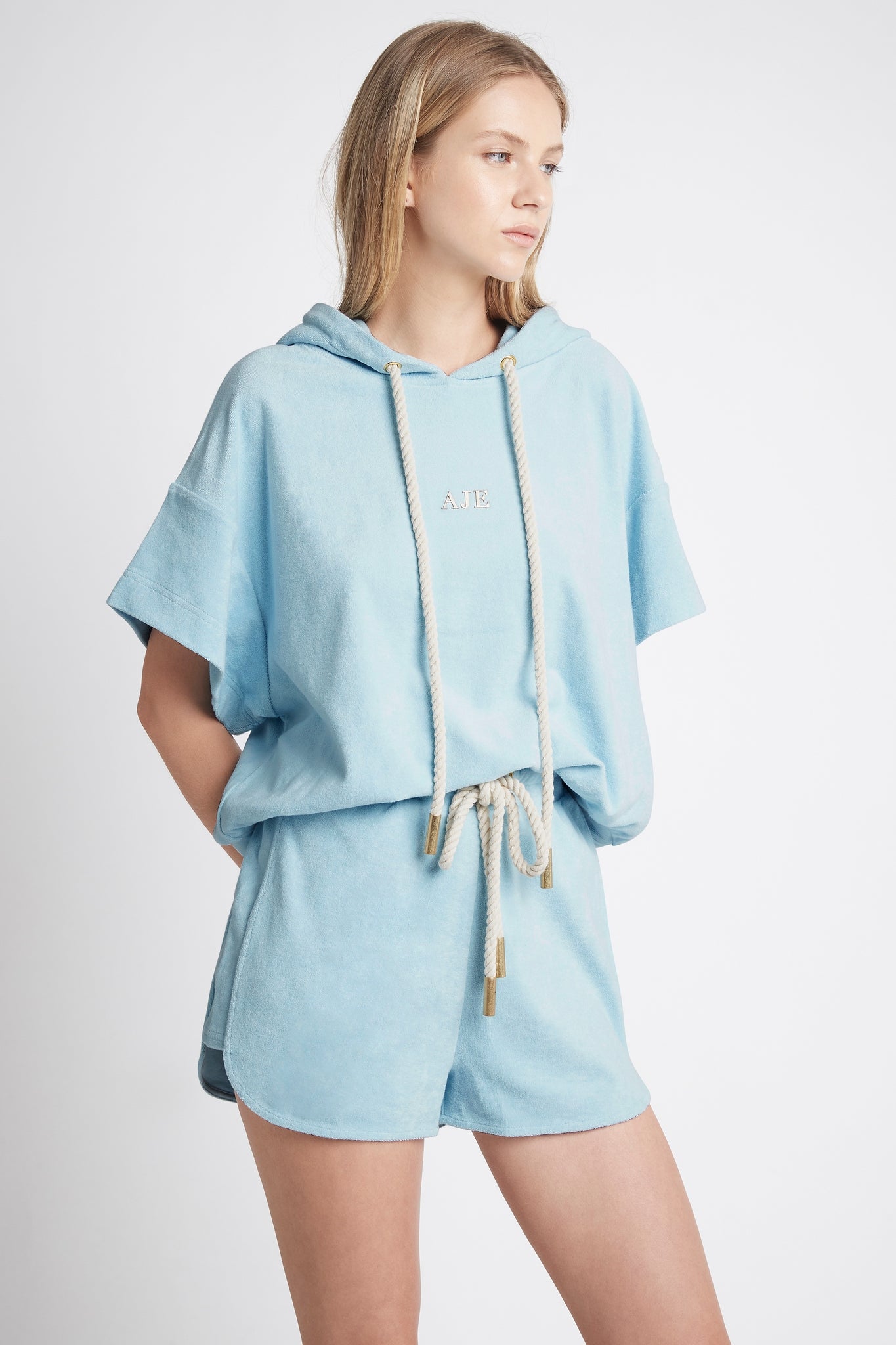 Dunes Terry Racer Shorts worn with Dunes Sleeveless Hoodie in Blue