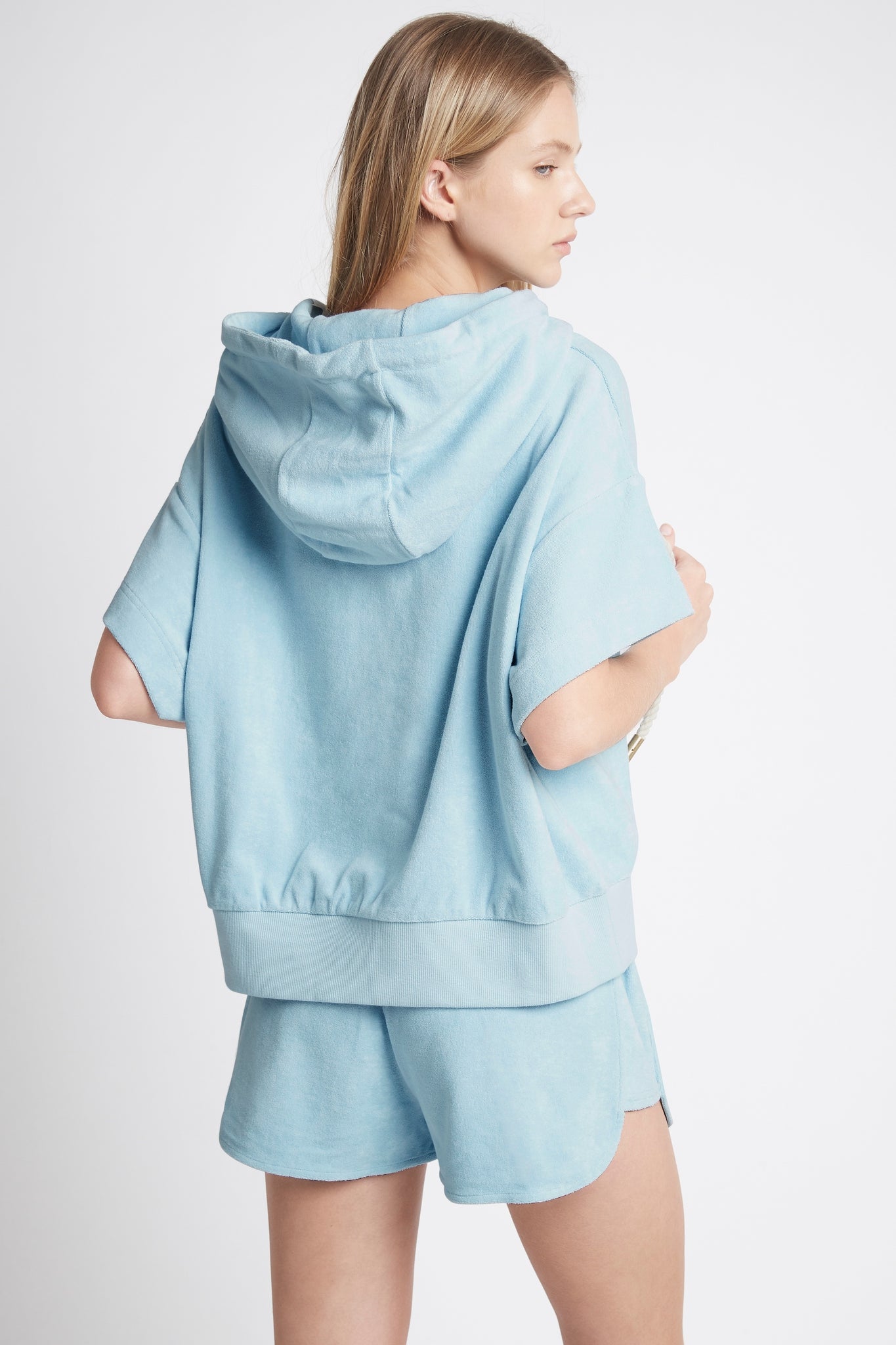Dunes Terry Racer Shorts worn with Dunes Sleeveless Hoodie in Blue Back View