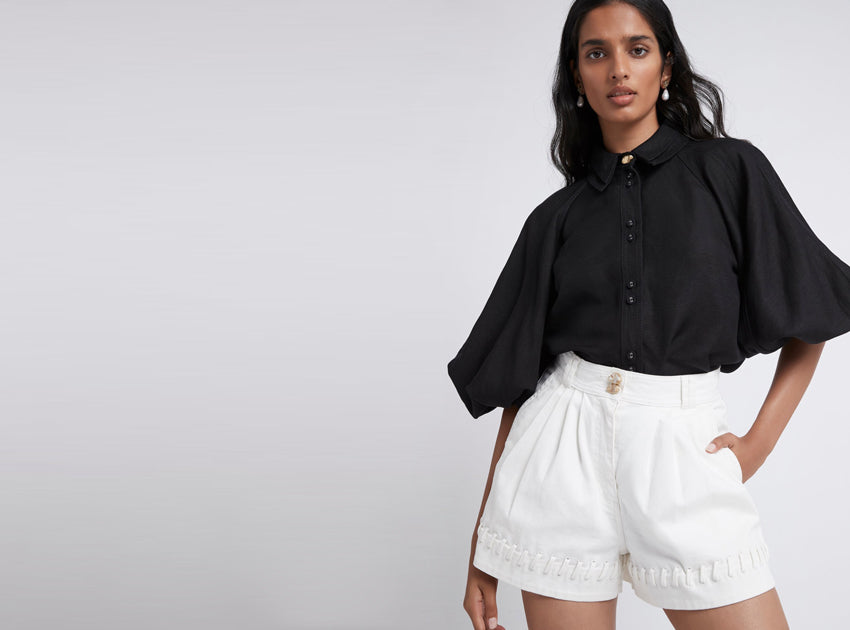 Triada Laced White Denim Shorts worn with Palms Puff Sleeve Shirt in Black